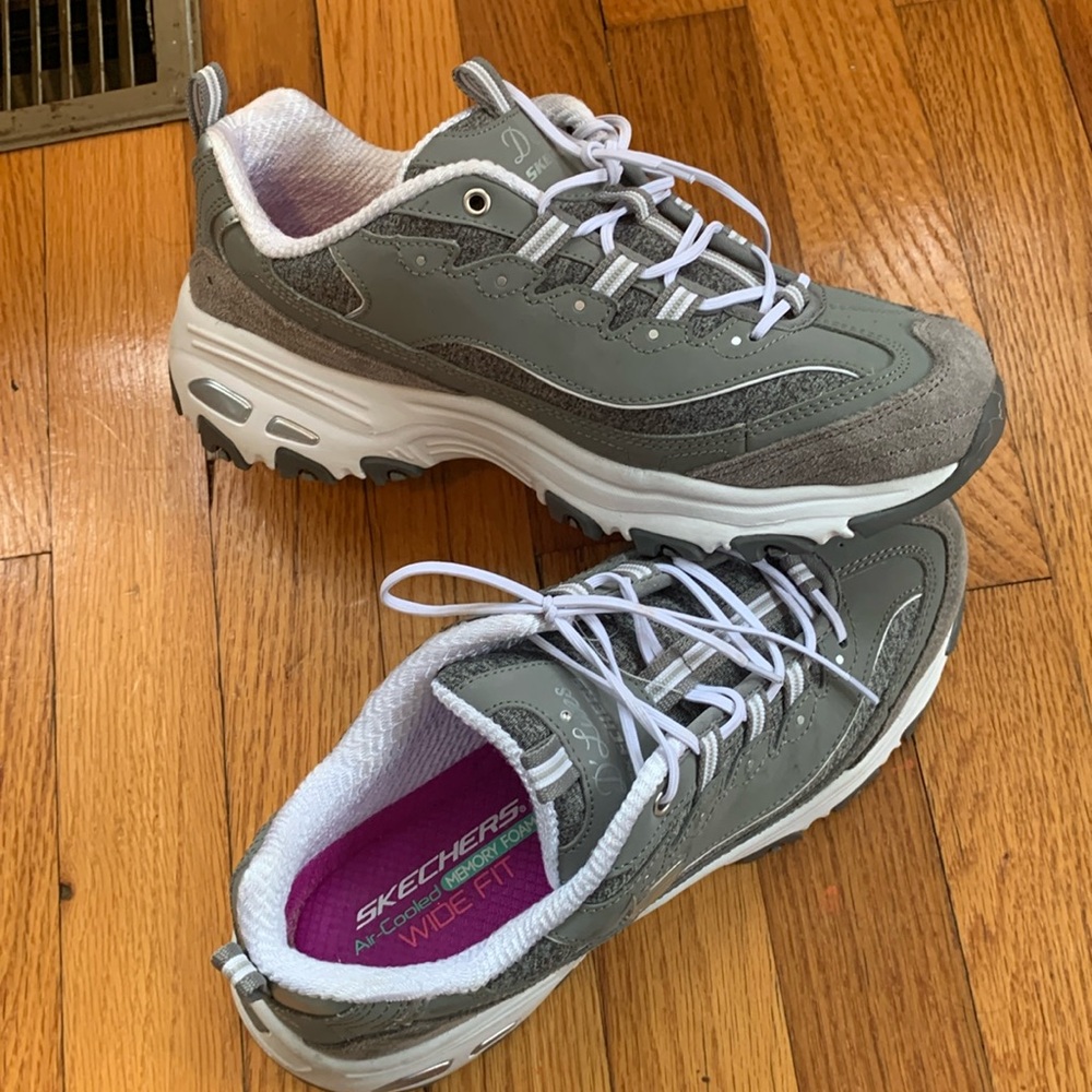 Women Skechers D’Lites.